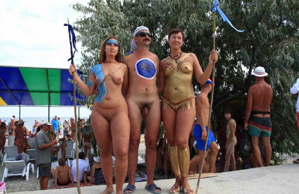 Three Painted Girl Poses pics - Nudism is an expression of freedom and individuality