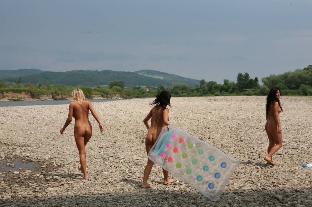 Naturist Park Floating On River photos - Naturists value harmony with nature and a simple way of life