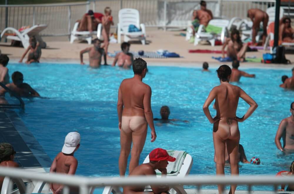 Pool-Shore Group Exercise - A nudist values inner balance and peace of mind