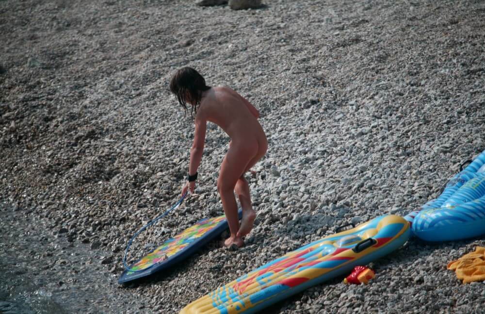 Naturist Surf Board Glides pics - Naturism promotes tolerance