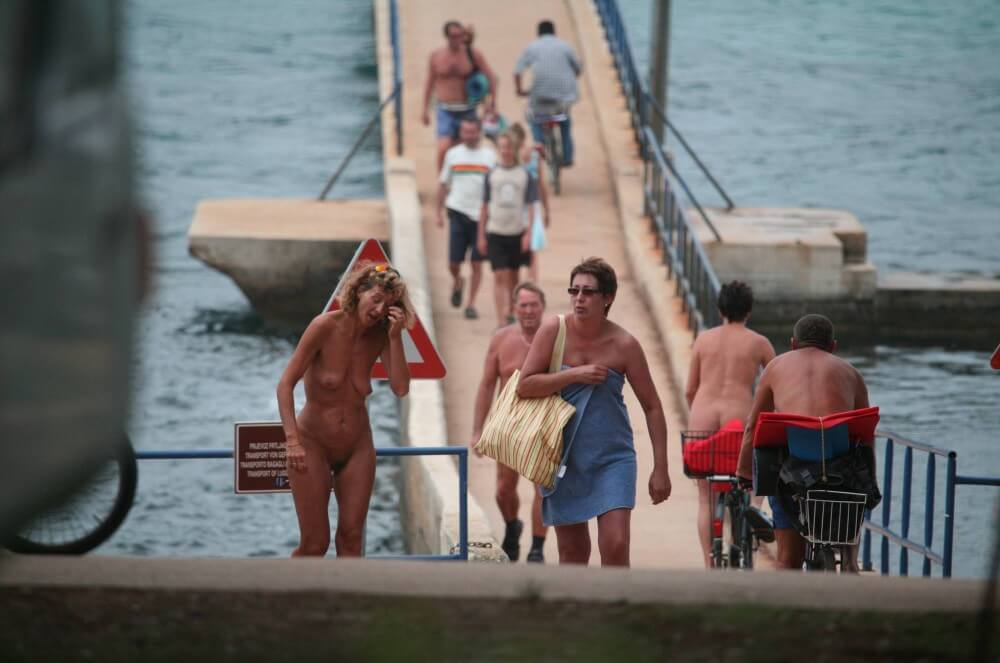 Crete FKK Bridge Crossing photos - A nude person strives for inner harmony and peace of mind