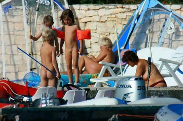 By the boat photos - Naturalness and freedom go hand in hand with naturism