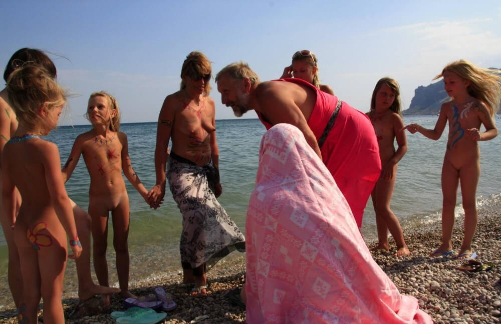 Water Drying Off pics - Nudism encourages love for nature and oneself