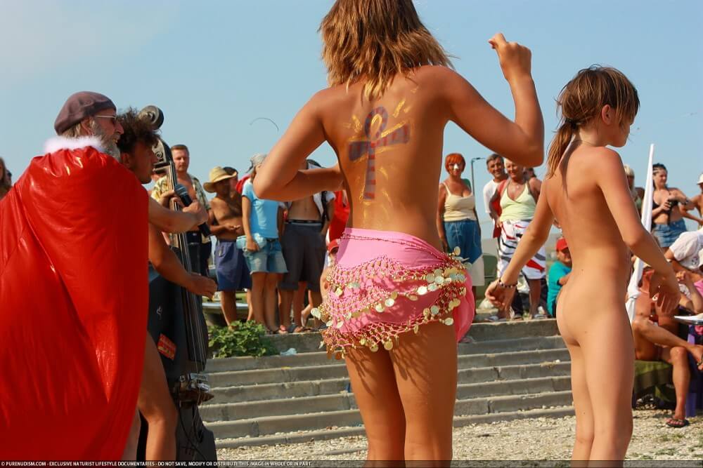 Colorful Carnival Dancing photos - Promoting nudism to the masses